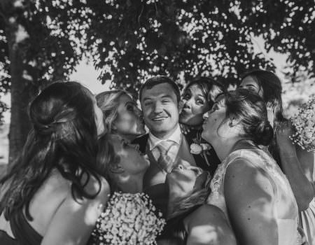 Everyone kiss the groom