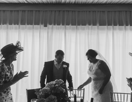 The bride and groom are seated