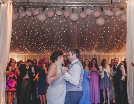 the bride and grooms first dance