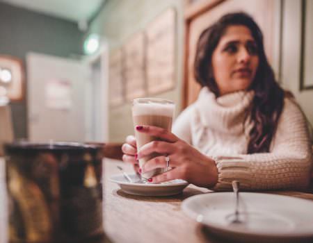 Engagement ring round coffee in engagement photo