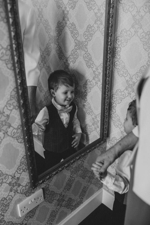 Pageboy looking in the mirror
