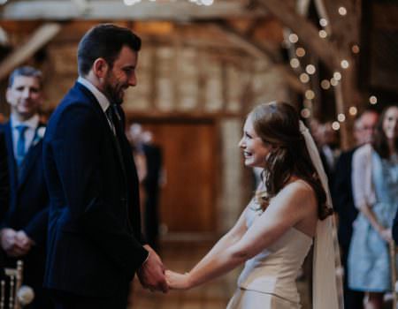 The look of love between bride and groom at Bassmead Manor Barn wedding