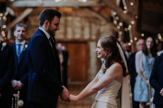The look of love between bride and groom at Bassmead Manor Barn wedding