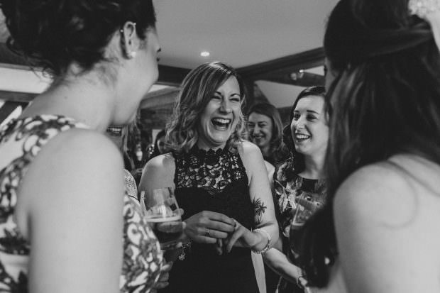 Guests laughing at Bassmead Manor Barn