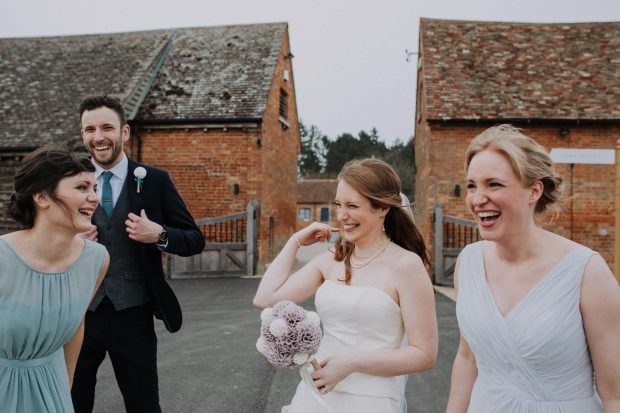Bridal party sharing a joke