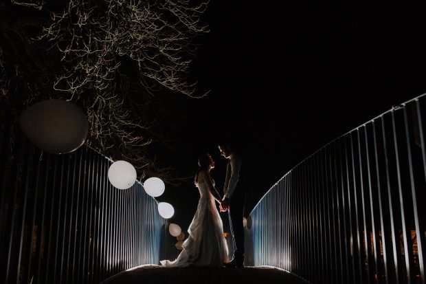 Night time portrait of bride and groom at Bassmead Manor Barns