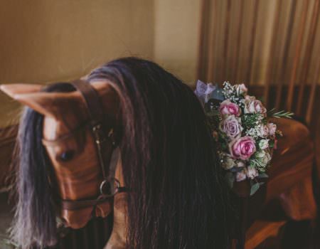 Leicester home wedding flowers on a rocking horse