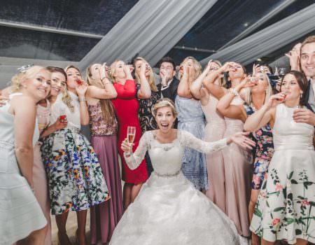 Girls doing shots at weddings