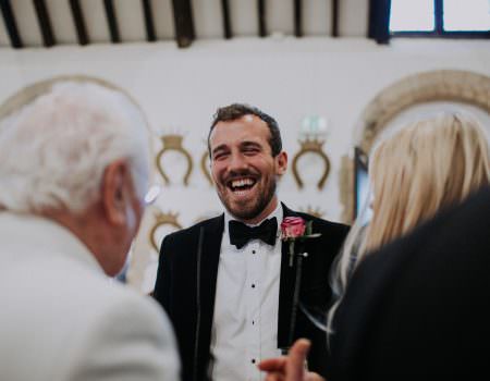 Guests enjoying wedding at Oakham Castle